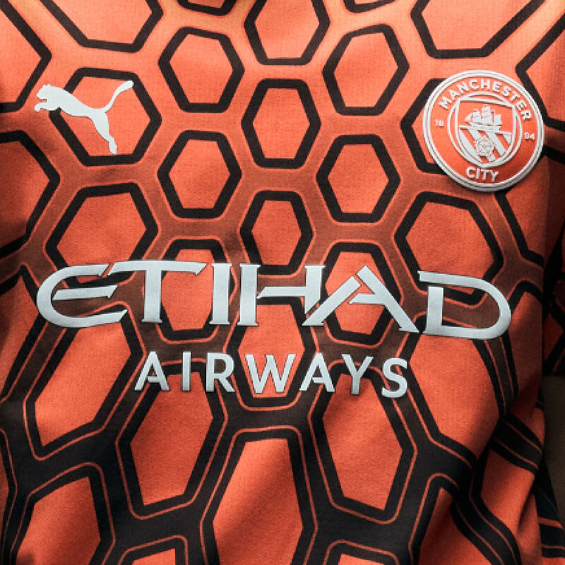 MCFC RP GK JERSEY SS - Hot Heat-PUMA Black