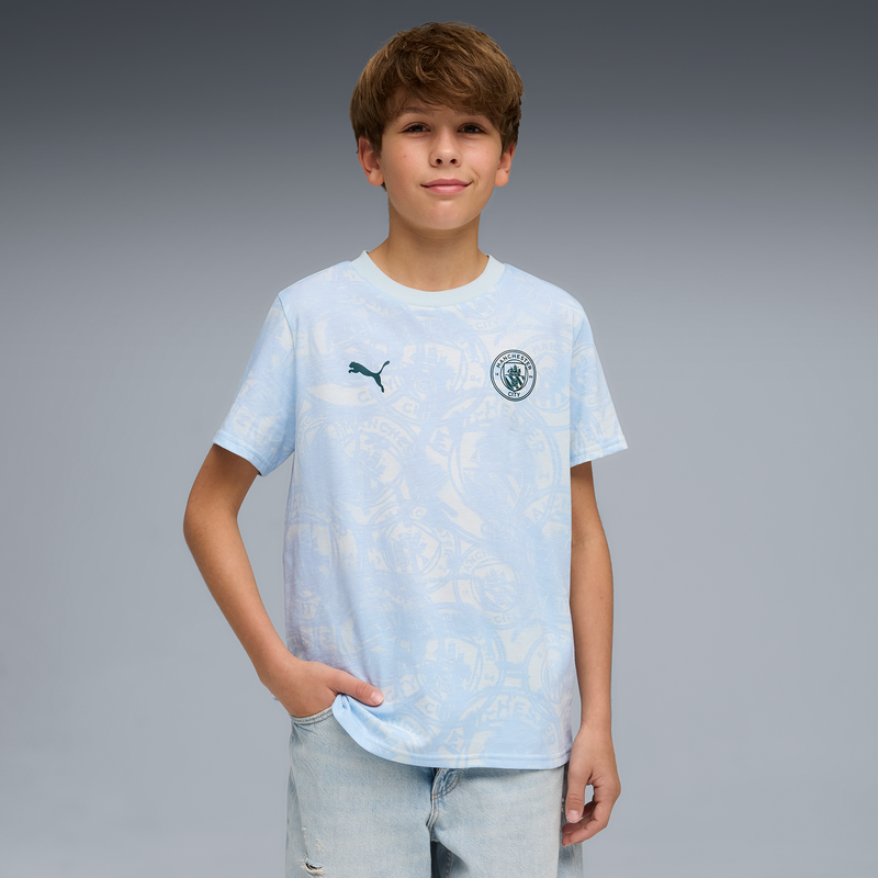 MCFC LW KIDS FTBLCULTURE TEE AOP - Sea Glass-Tropical Blue