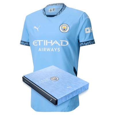 Camiseta auténtica de local del Manchester City 2024/25 en caja de regalo.