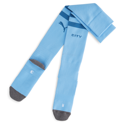 Calcetines de la 1.ª equipación infantil del Manchester City 2023/24