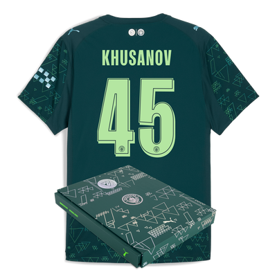 Manchester City EA SPORTS FC Camiseta Auténtica 2025/26 con estampado KHUSANOV 45 en caja de regalo