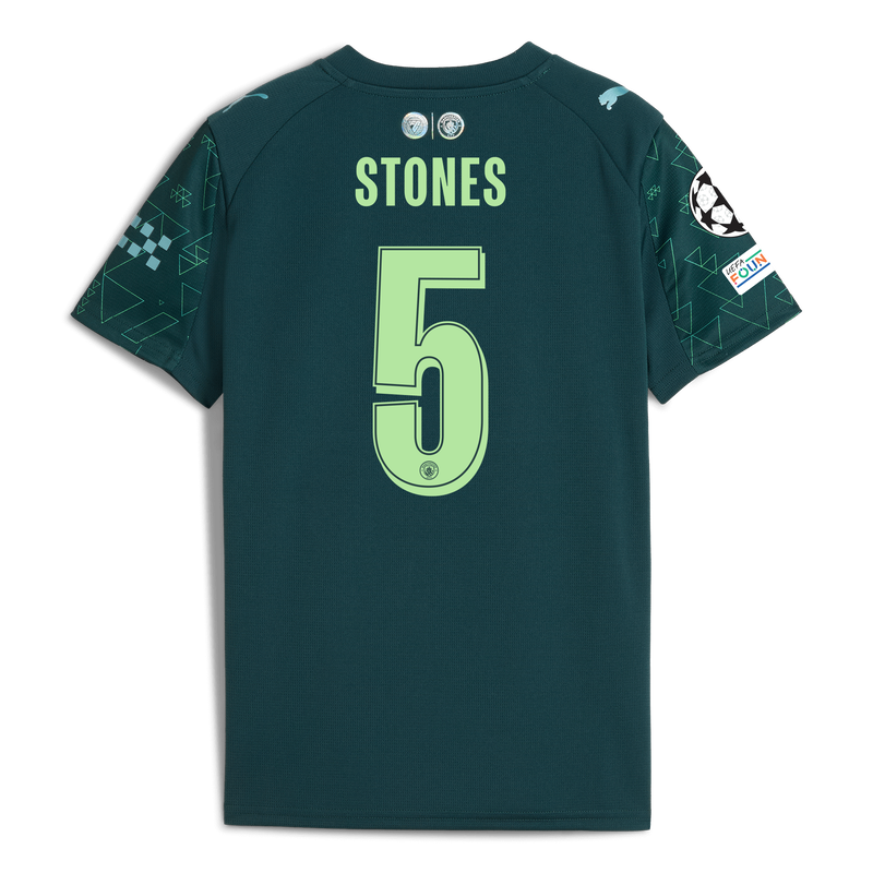 Kids' Man City EA SPORTS FC Jersey 2025/26 With STONES 5 Printing green - Check out all Manchester City t-shirts online - Official Manchester City FC store