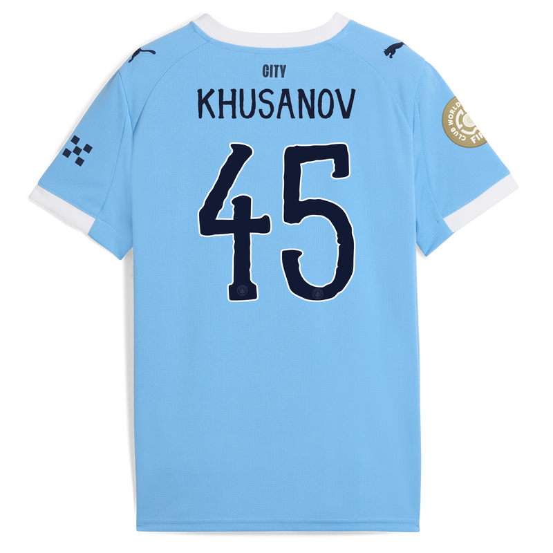 Kids' Man City Home Jersey 2025/26 With KHUSANOV 45 Printing  blue - Check out all Manchester City t-shirts online - Official Manchester City FC store