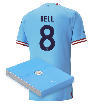 Camiseta Authentic 1ª Equipación Manchester City 2022/23 con estampado de BELL en caja de regalo