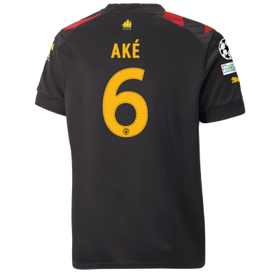 Kids' Manchester City Away Jersey 2022/23 with AKÉ 6 printing