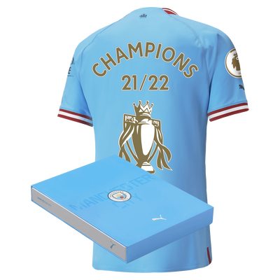 Camiseta Authentic 1ª Equipación Manchester City 2022/23 con estampado CHAMPIONS en caja de regalo