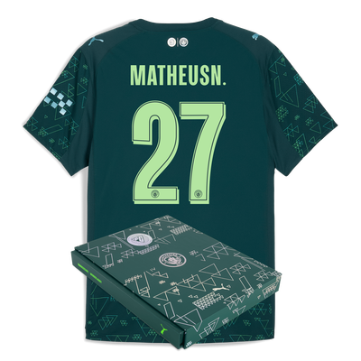 Manchester City EA SPORTS FC Camiseta Auténtica 2025/26 con estampado MATHEUS N. 27 en caja de regalo