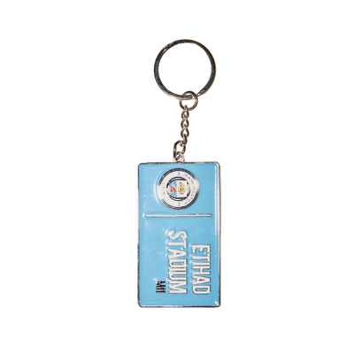 Porte-clés avec panneau routier Manchester City